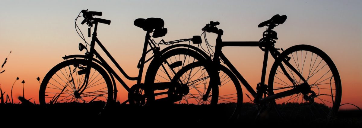 Bicycle silhouettes at sunset.