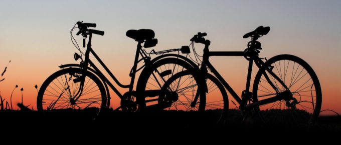 Bicycle silhouettes at sunset.