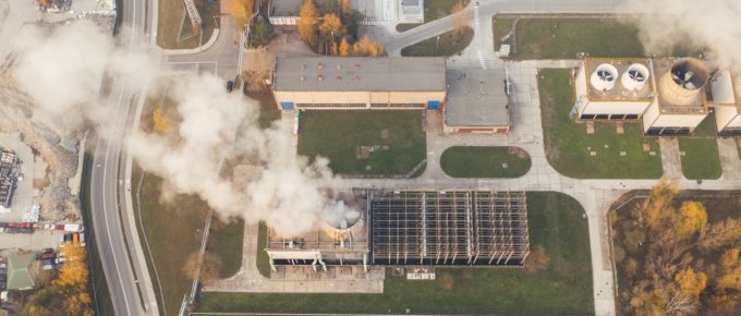 Industrial buildings producing air pollution.