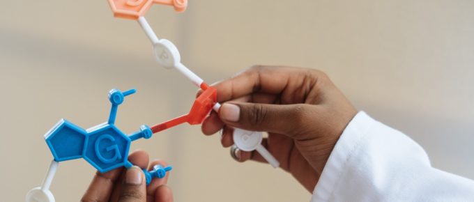 Materiality - Hands holding chemical structure model
