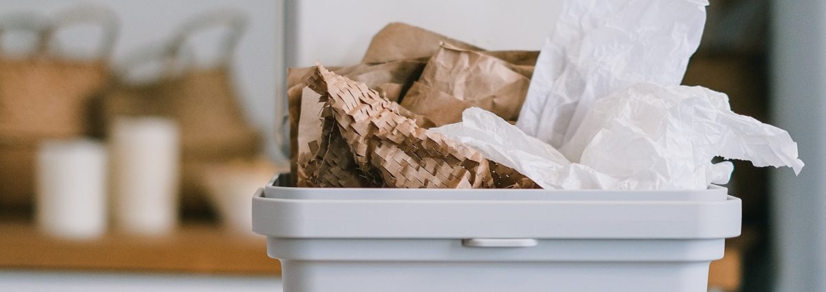 Paper packaging in a bin.